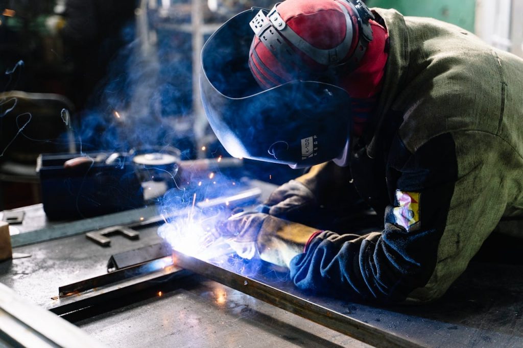 Welder working in Factory