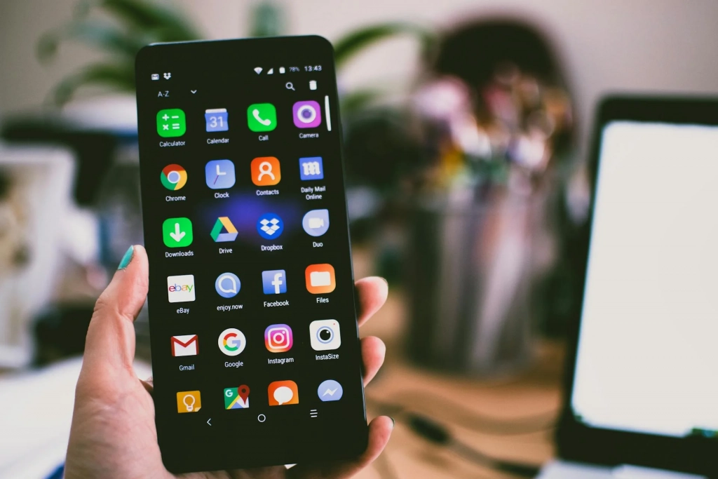 Person Holding Turned On Smartphone